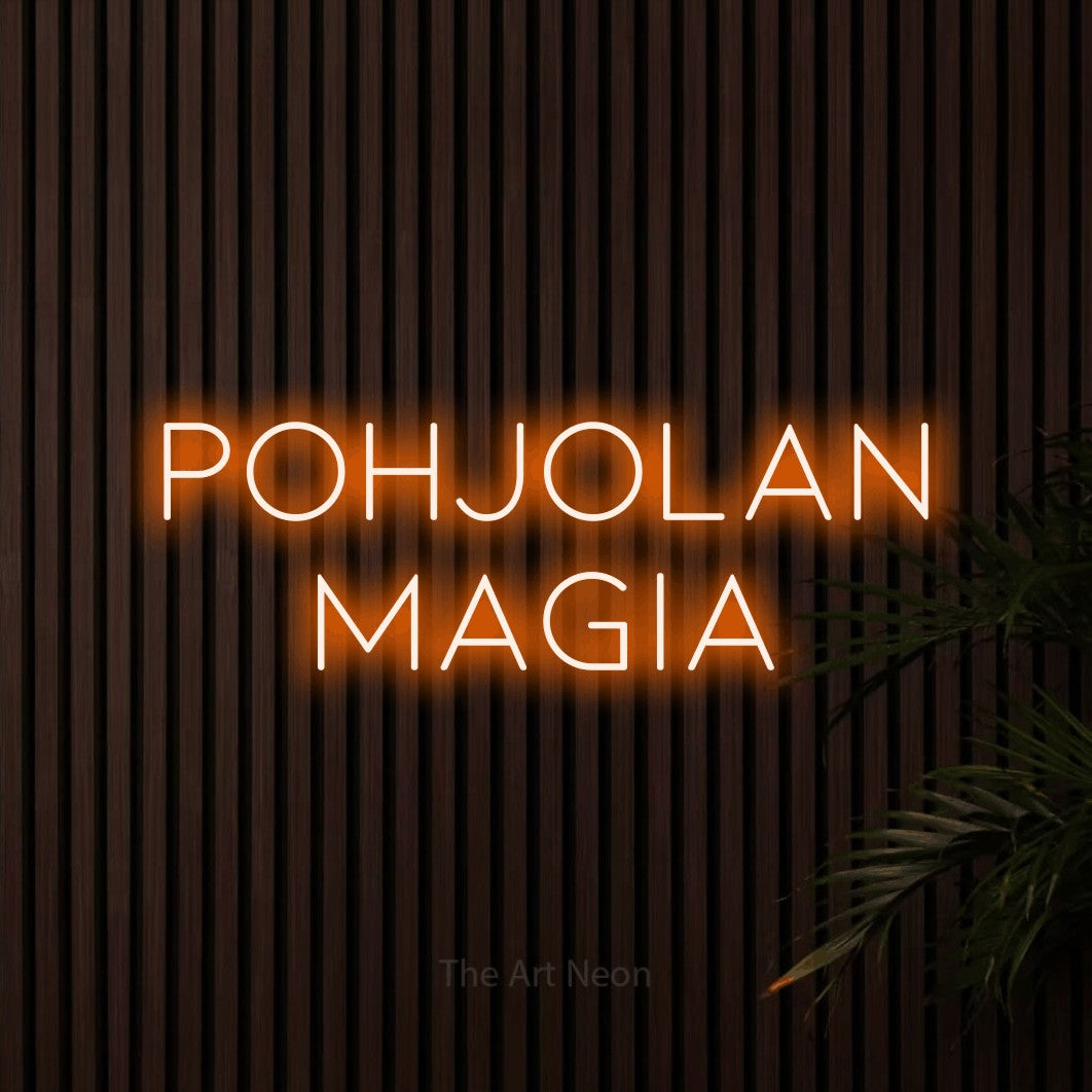 LED neon sign reading “pohjolan magia”, arranged in 2 lines.