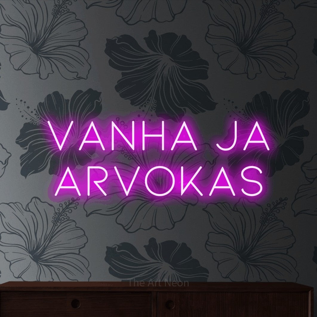 LED neon sign reading “Vanha ja arvokas”, arranged in 2 lines.