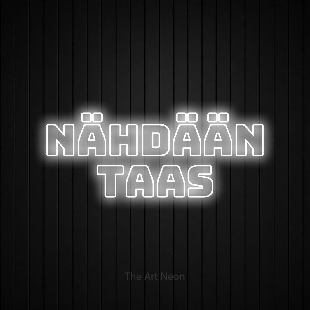 LED neon sign reading “nähdään taas”, arranged in 2 lines.