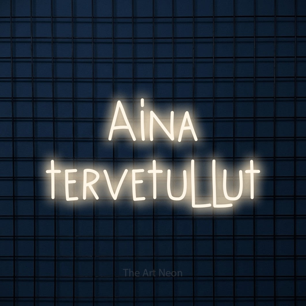 LED neon sign reading “Aina tervetullut”, arranged in 2 lines.