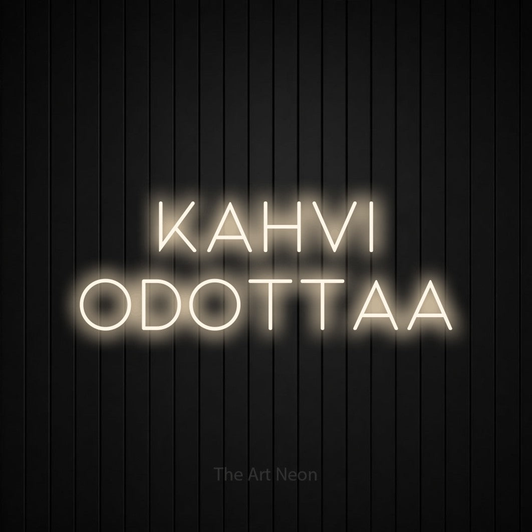 LED neon sign reading “KAHVI ODOTTAA”, arranged in 2 lines.