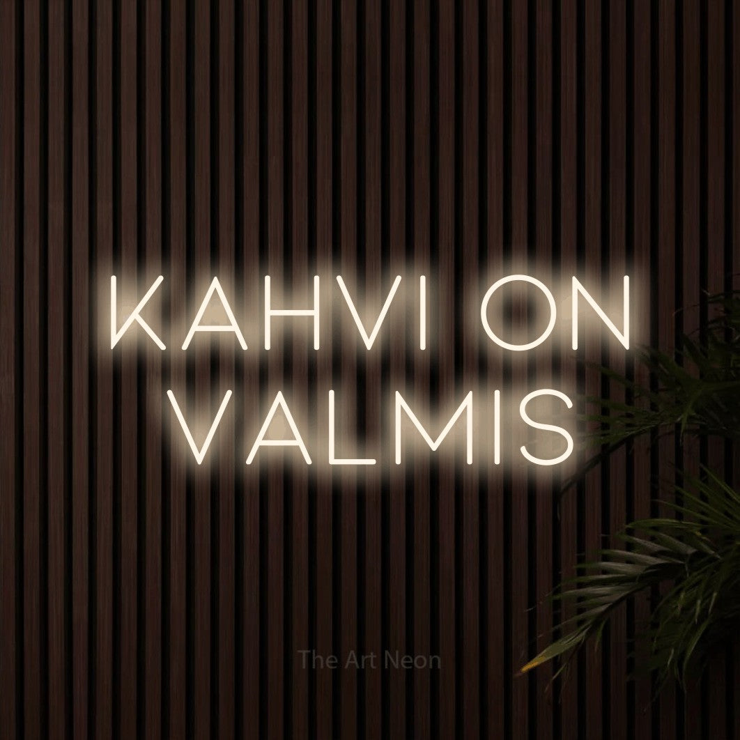 LED neon sign reading “Kahvi on valmis”, arranged in 2 lines.