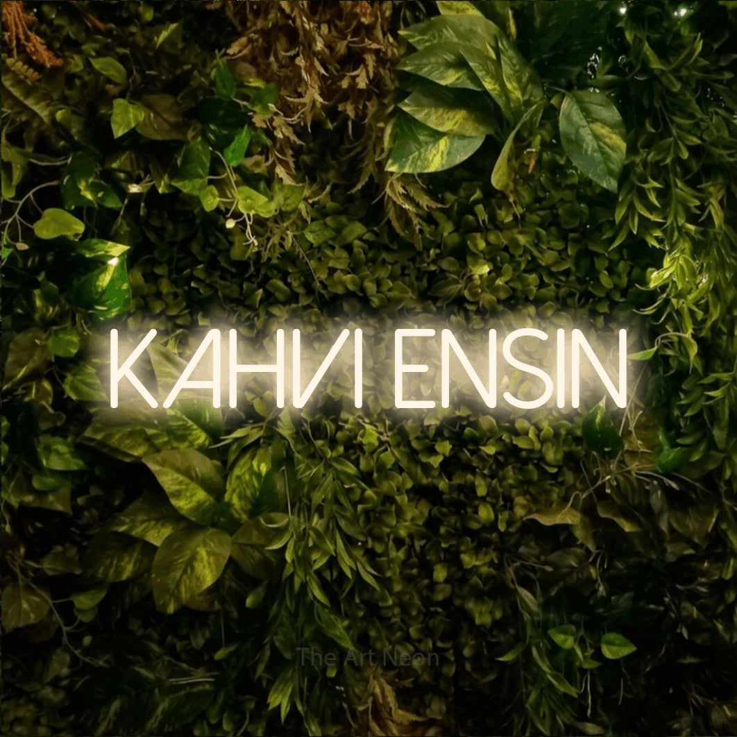 LED neon sign reading “Kahvi ensin”, arranged in a single line.