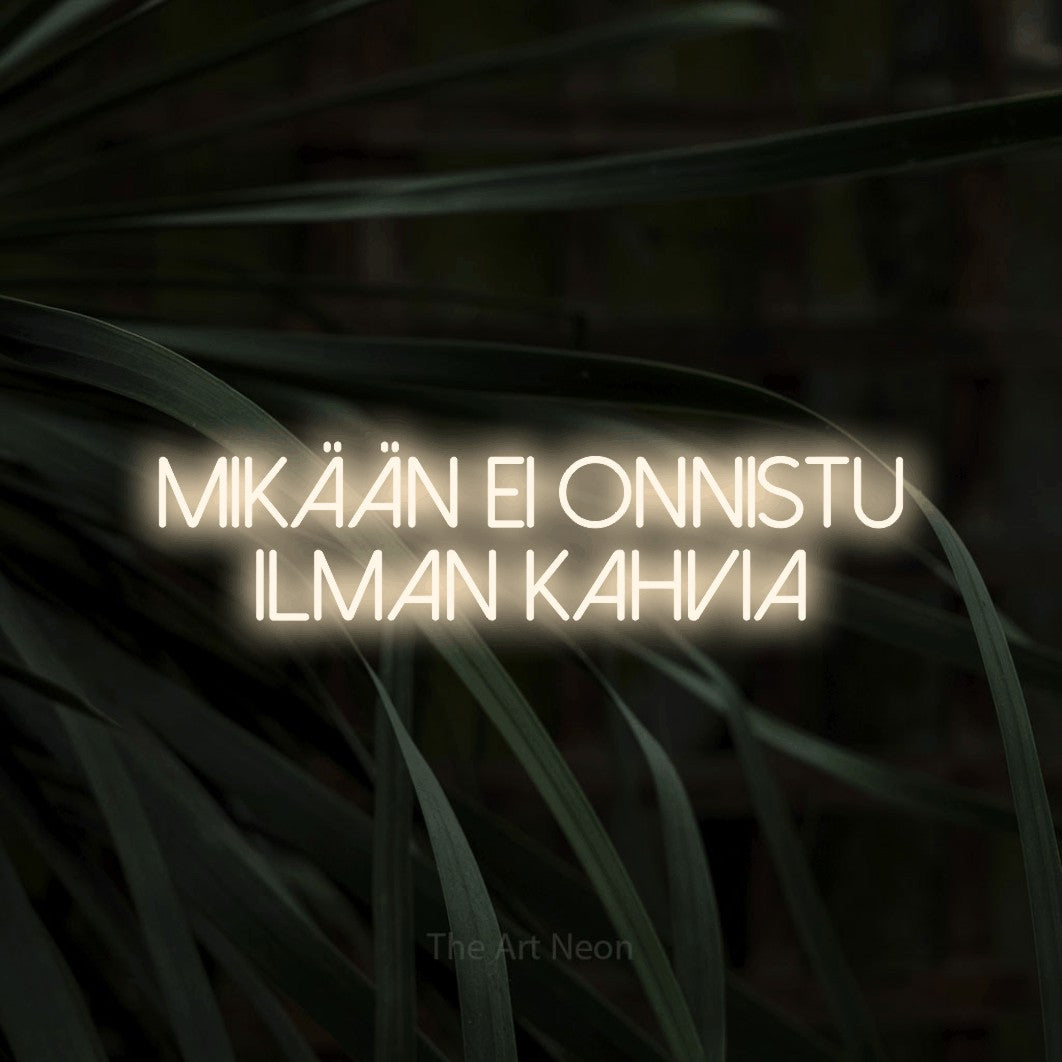 LED neon sign reading “mikään ei onnistu ilman kahvia”, arranged in 2 lines.