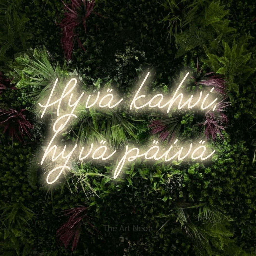 LED neon sign reading “Hyvä kahvi, hyvä päivä”, arranged in 2 lines.
