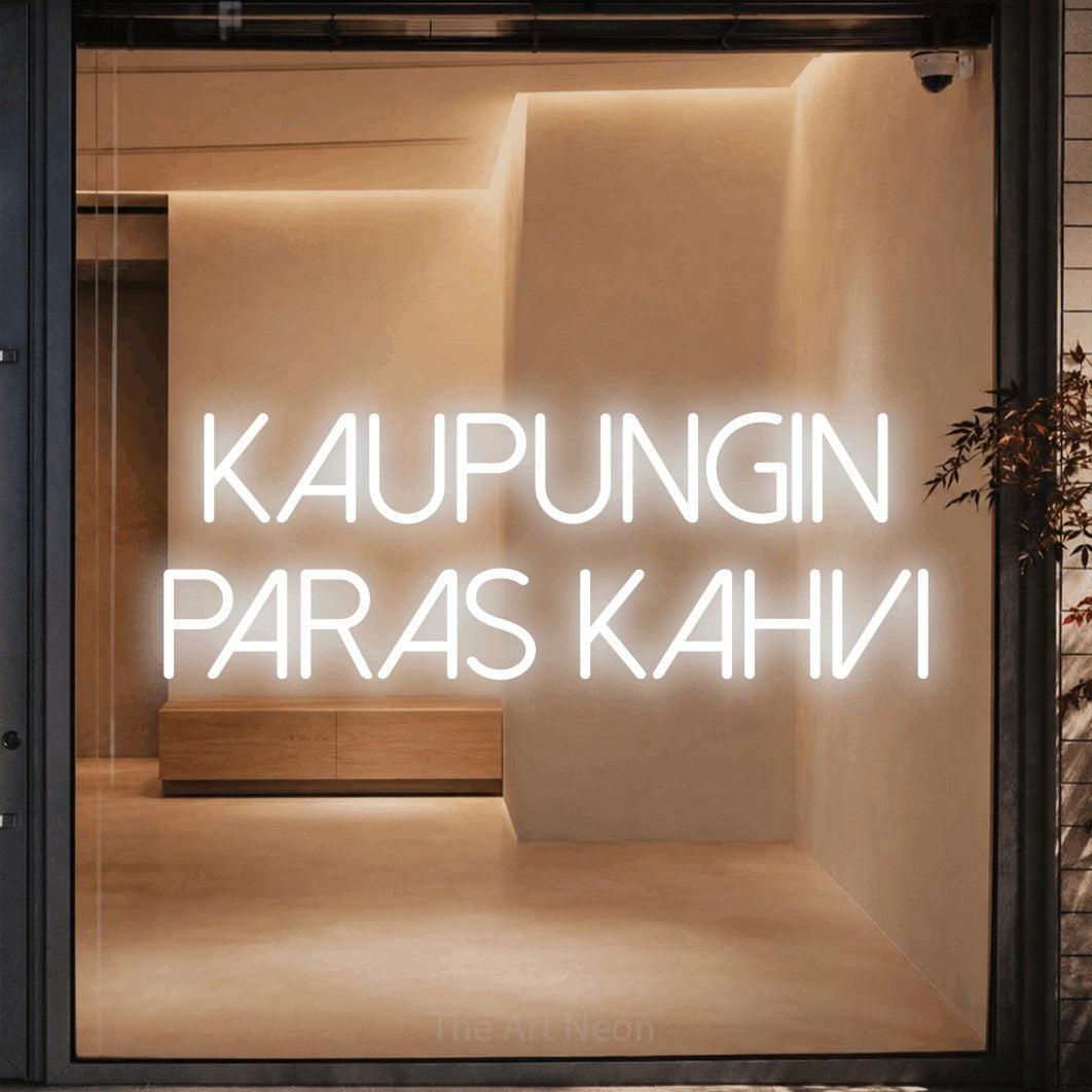 LED neon sign reading “kaupungin paras kahvi”, arranged in 2 lines.