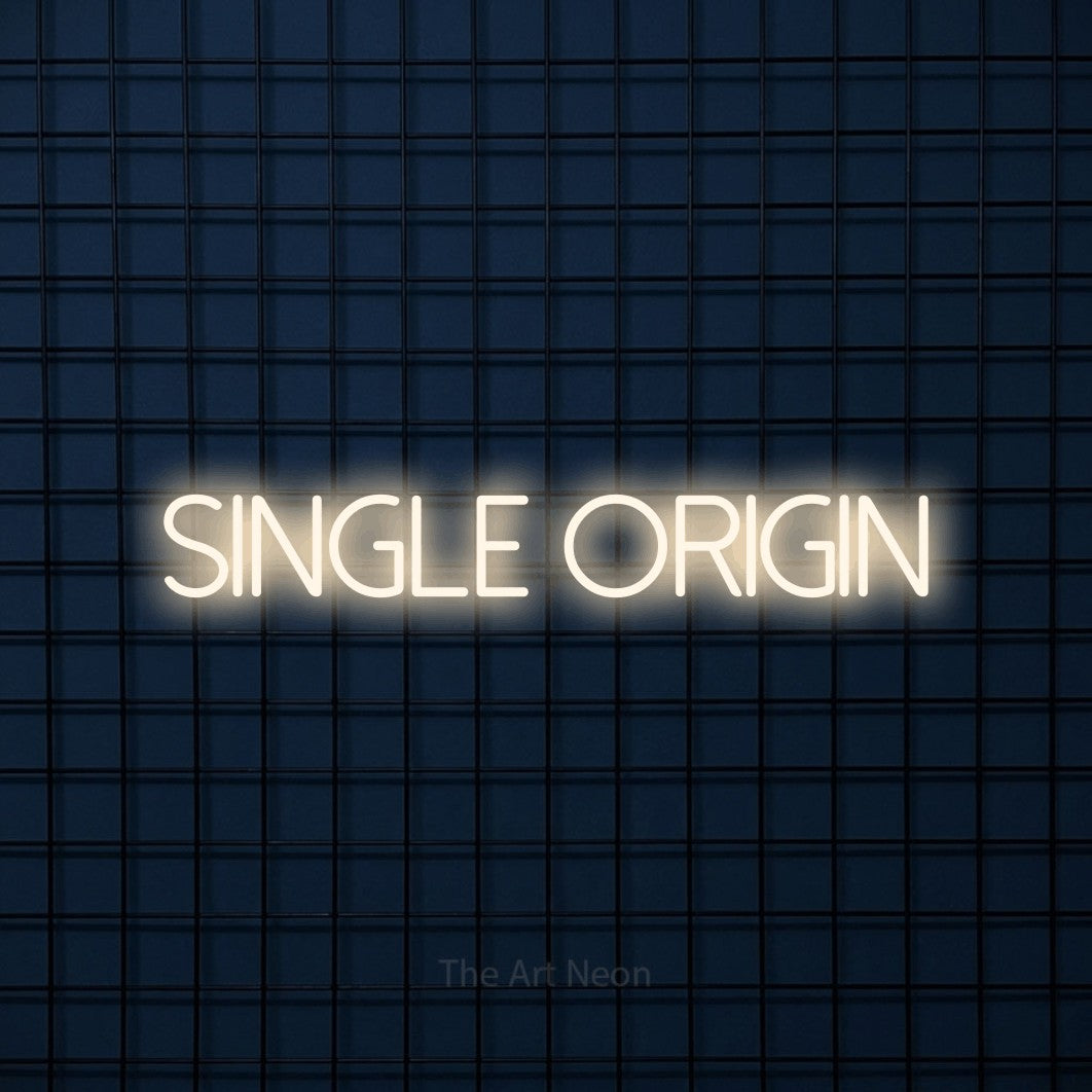 LED neon sign reading “Single origin”, arranged in a single line.