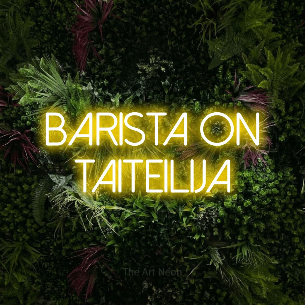 LED neon sign reading “BARISTA ON TAITEILIJA”, arranged in 2 lines.