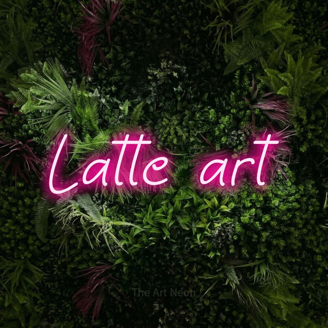 LED neon sign reading “Latte art”, arranged in a single line.