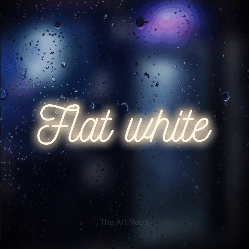 LED neon sign reading “Flat white”, arranged in a single line.