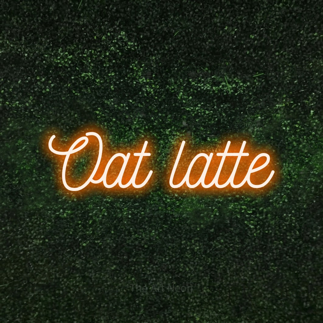 LED neon sign reading “Oat latte”, arranged in a single line.