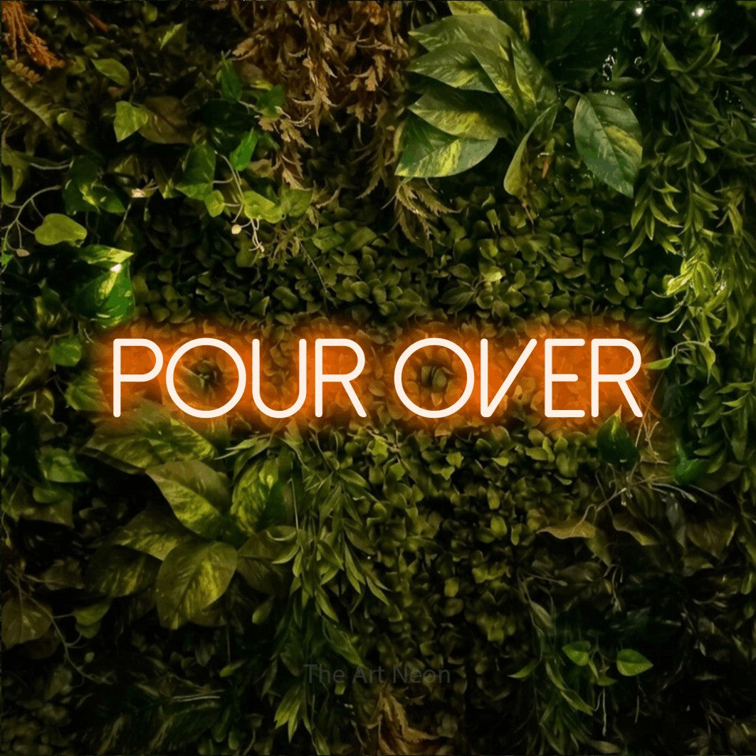 LED neon sign reading “Pour over”, arranged in a single line.