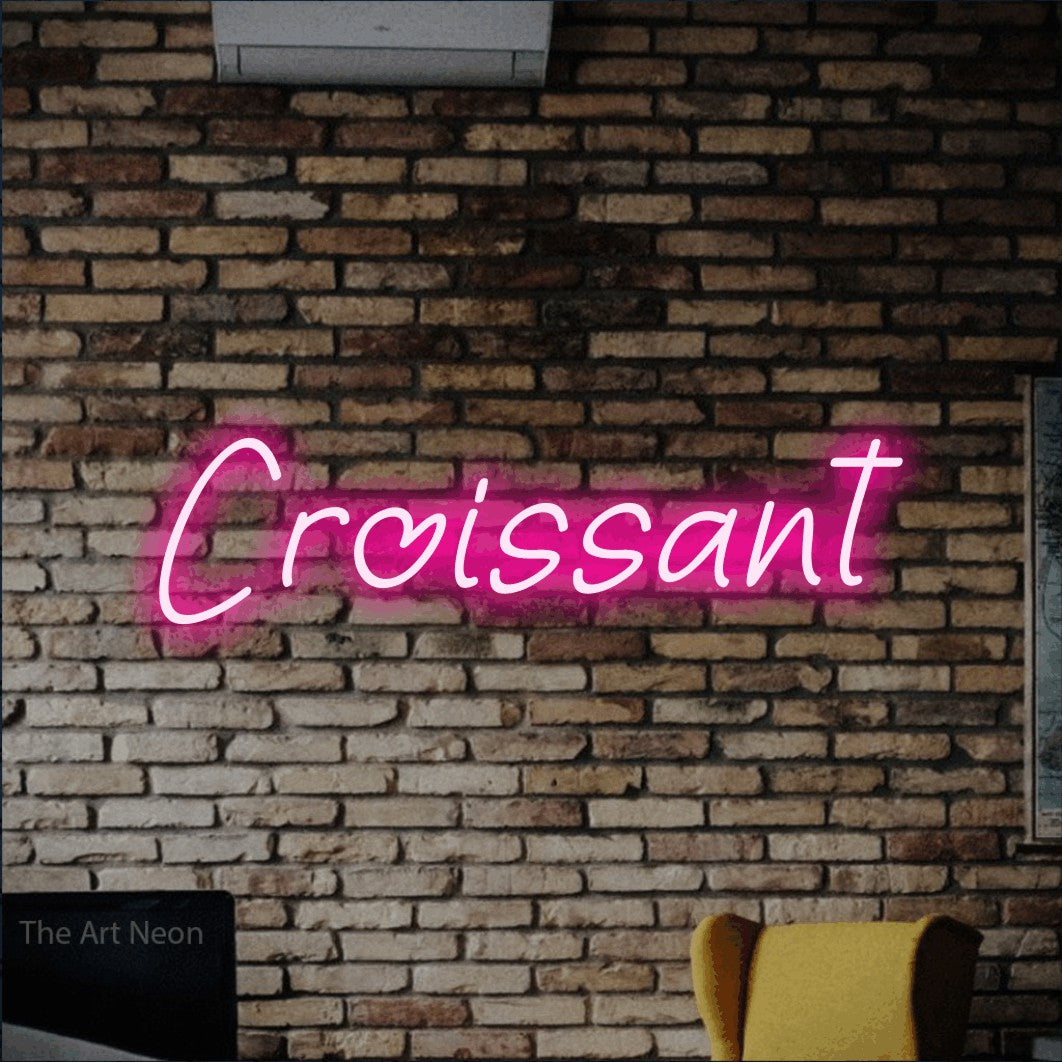LED neon sign reading “Croissant”, arranged in a single line.