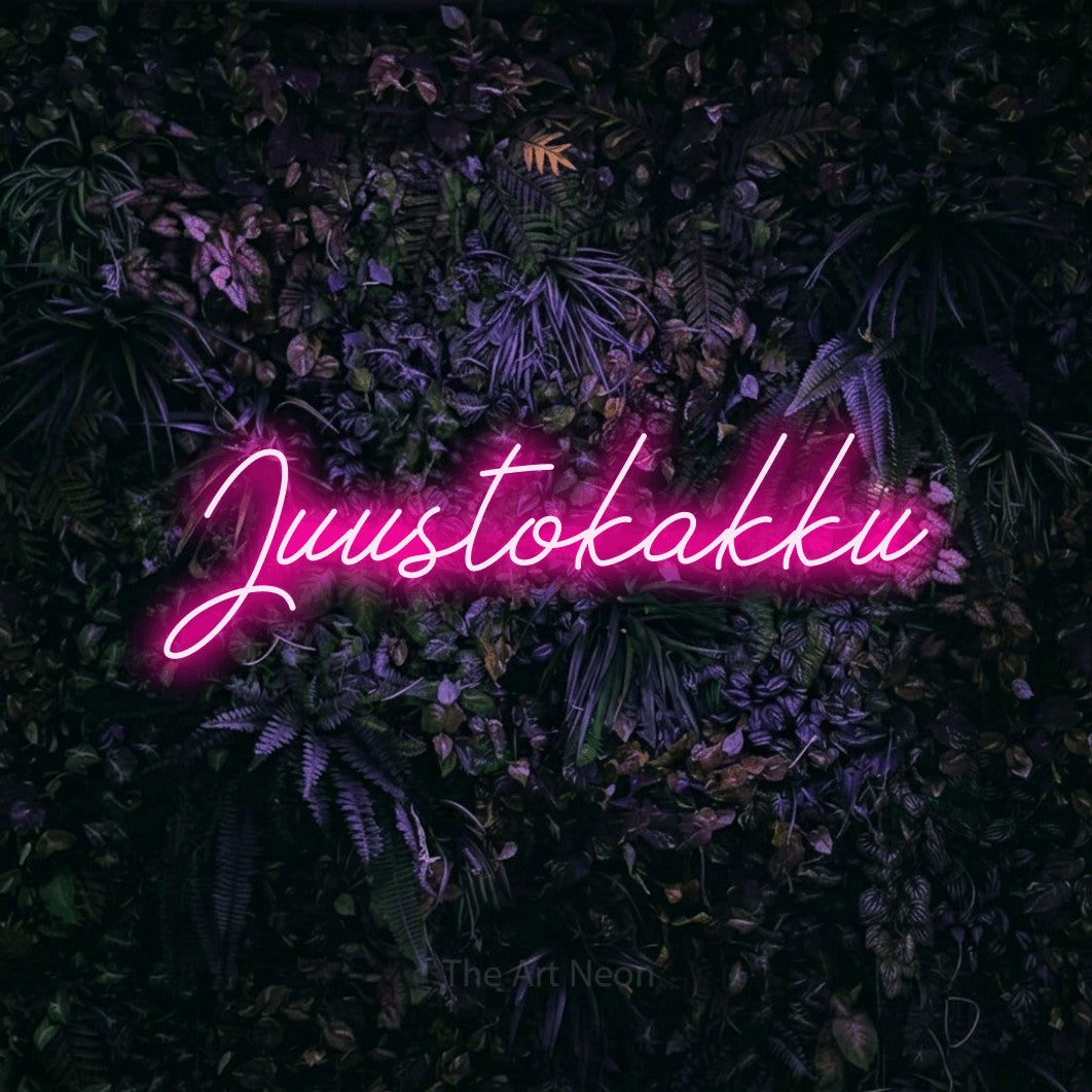 LED neon sign reading “Juustokakku”, arranged in a single line.