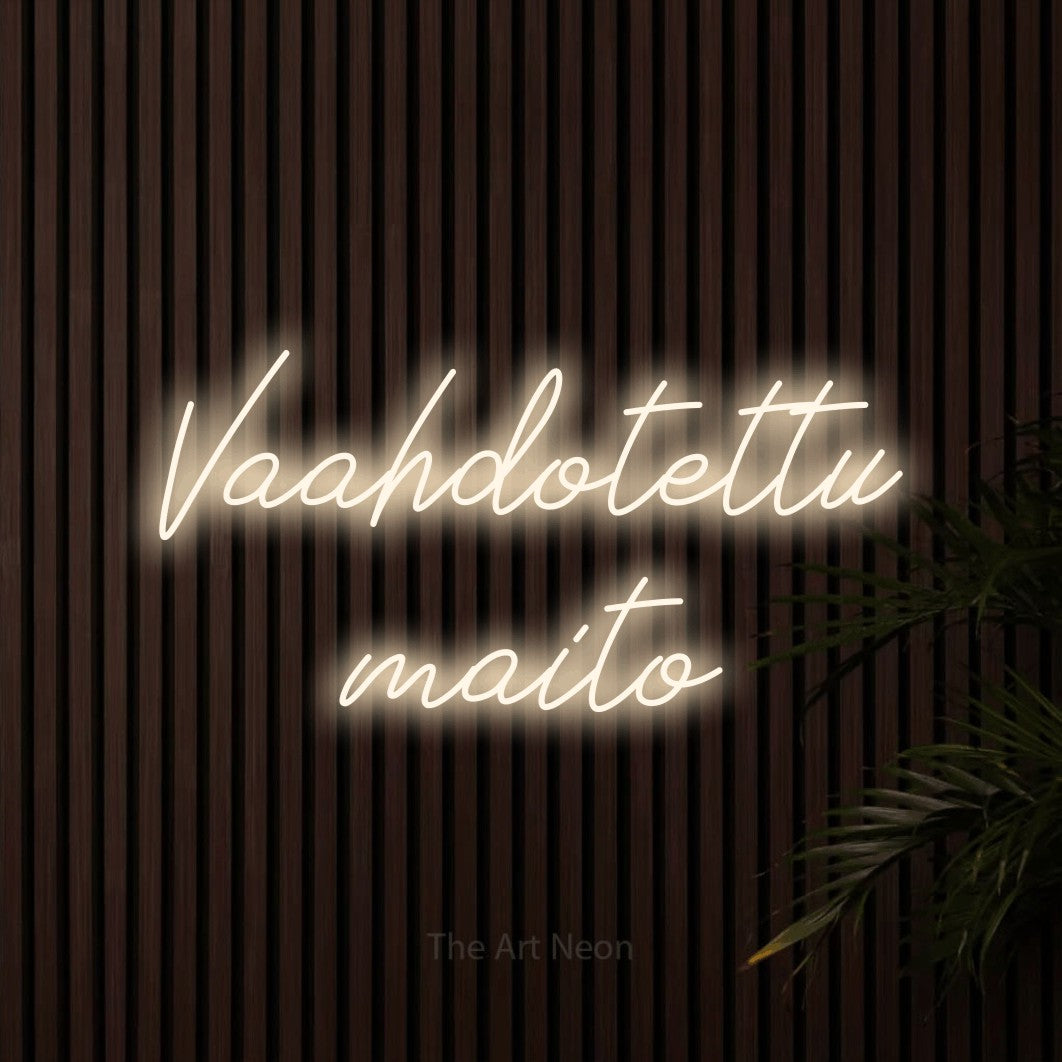 LED neon sign reading “Vaahdotettu maito”, arranged in 2 lines.