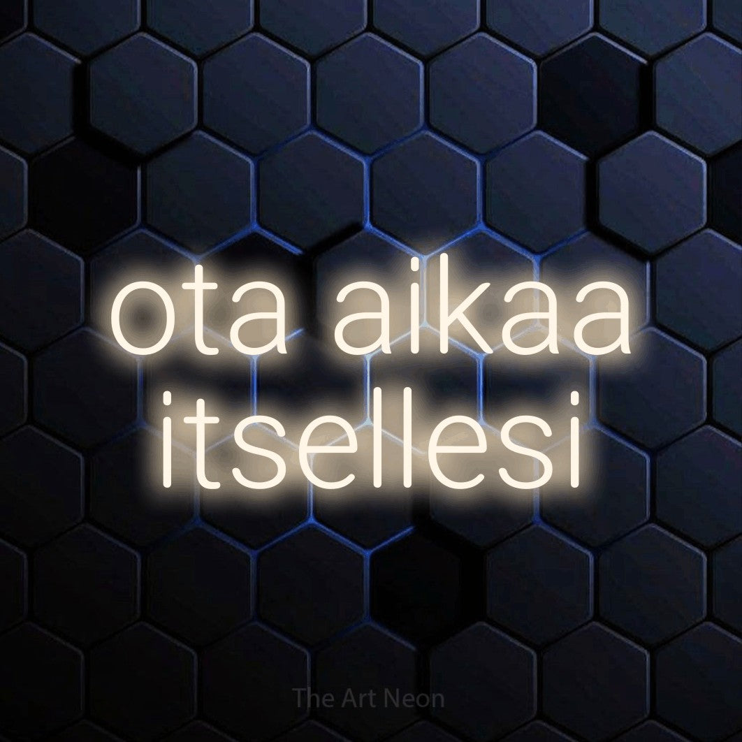 LED neon sign reading “ota aikaa itsellesi”, arranged in 2 lines.