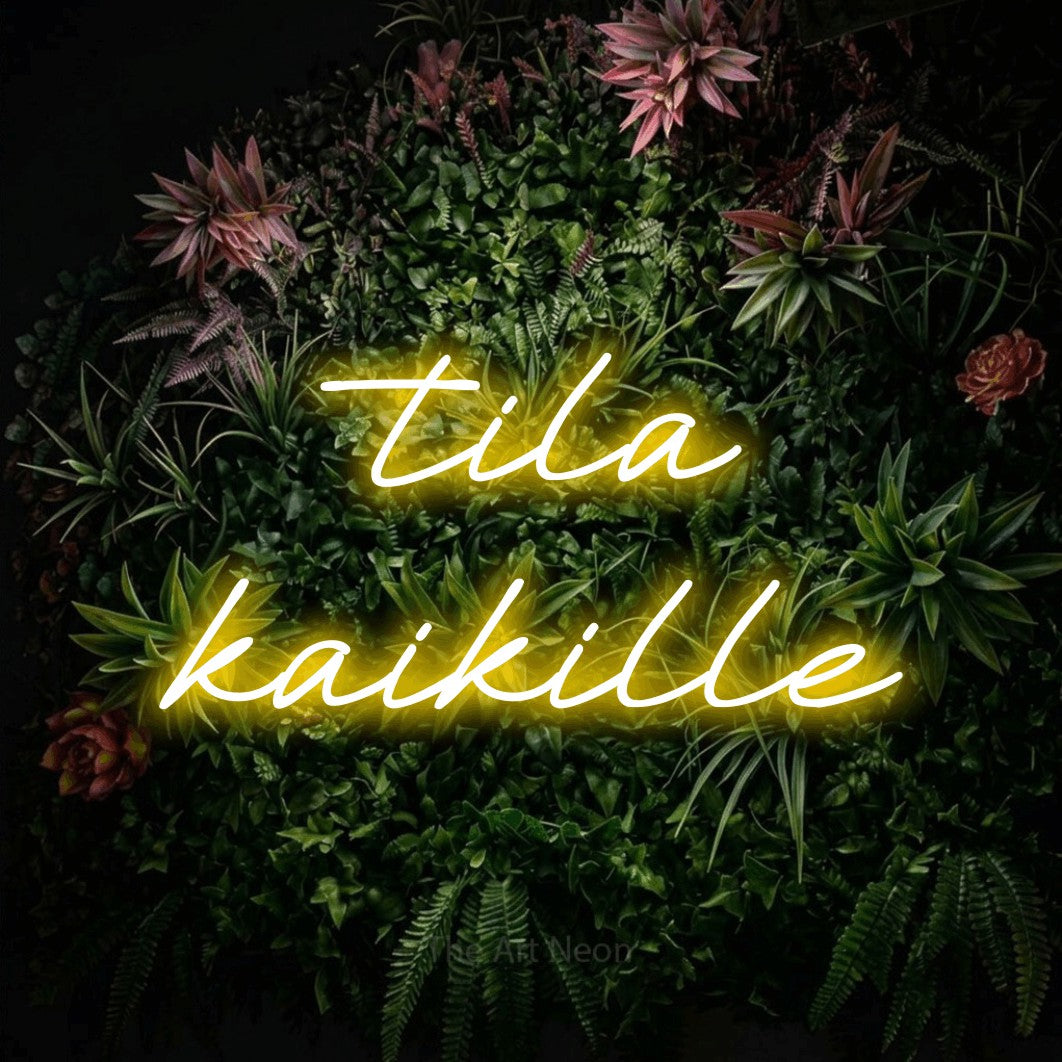LED neon sign reading “tila kaikille”, arranged in 2 lines.
