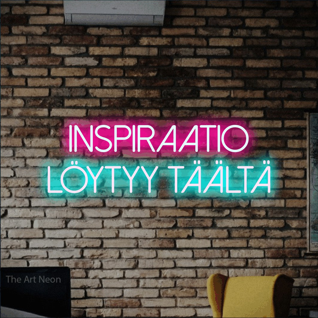 LED neon sign reading “Inspiraatio löytyy täältä”, arranged in 2 lines.