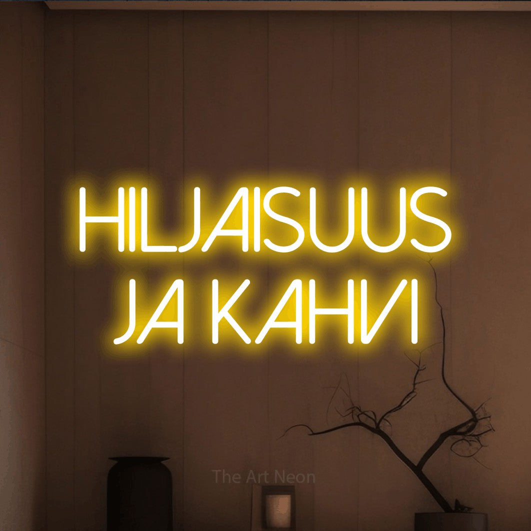LED neon sign reading “hiljaisuus ja kahvi”, arranged in 2 lines.