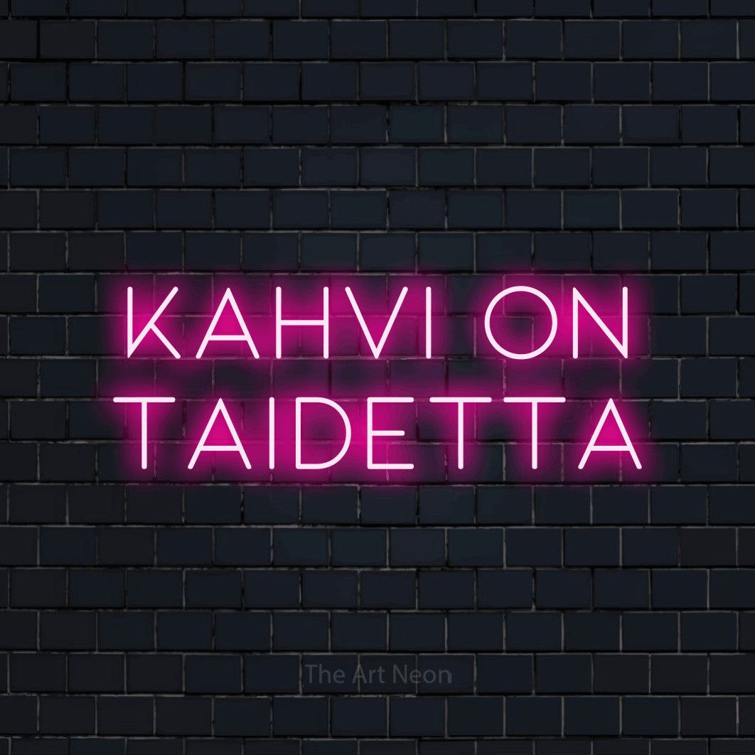 LED neon sign reading “Kahvi on taidetta”, arranged in 2 lines.