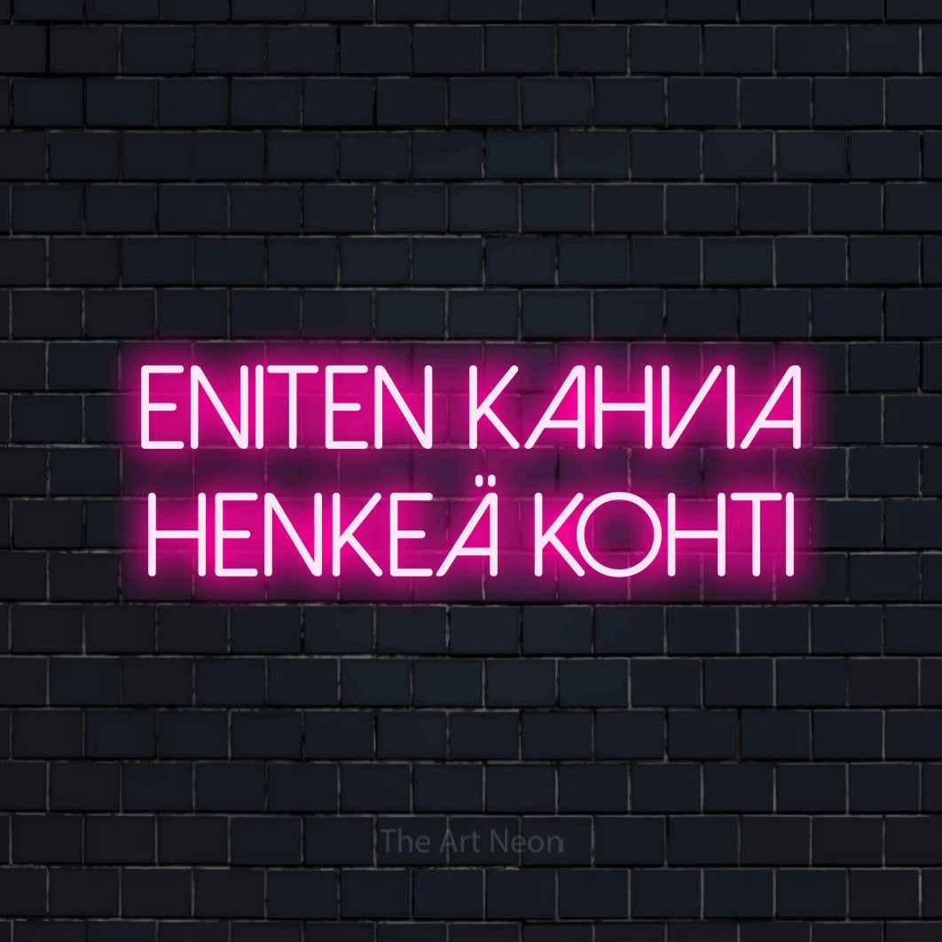 LED neon sign reading “Eniten kahvia henkeä kohti”, arranged in 2 lines.