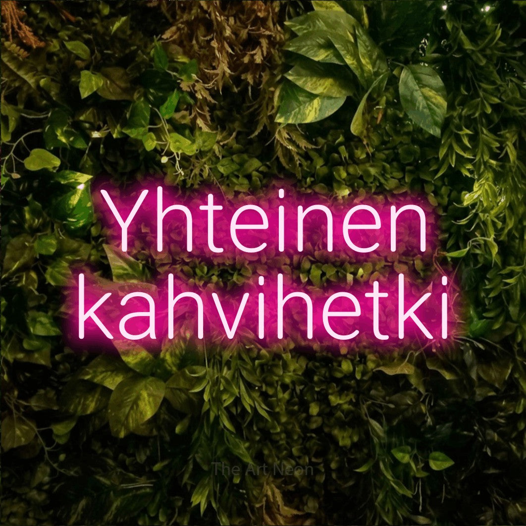 LED neon sign reading “Yhteinen kahvihetki”, arranged in 2 lines.