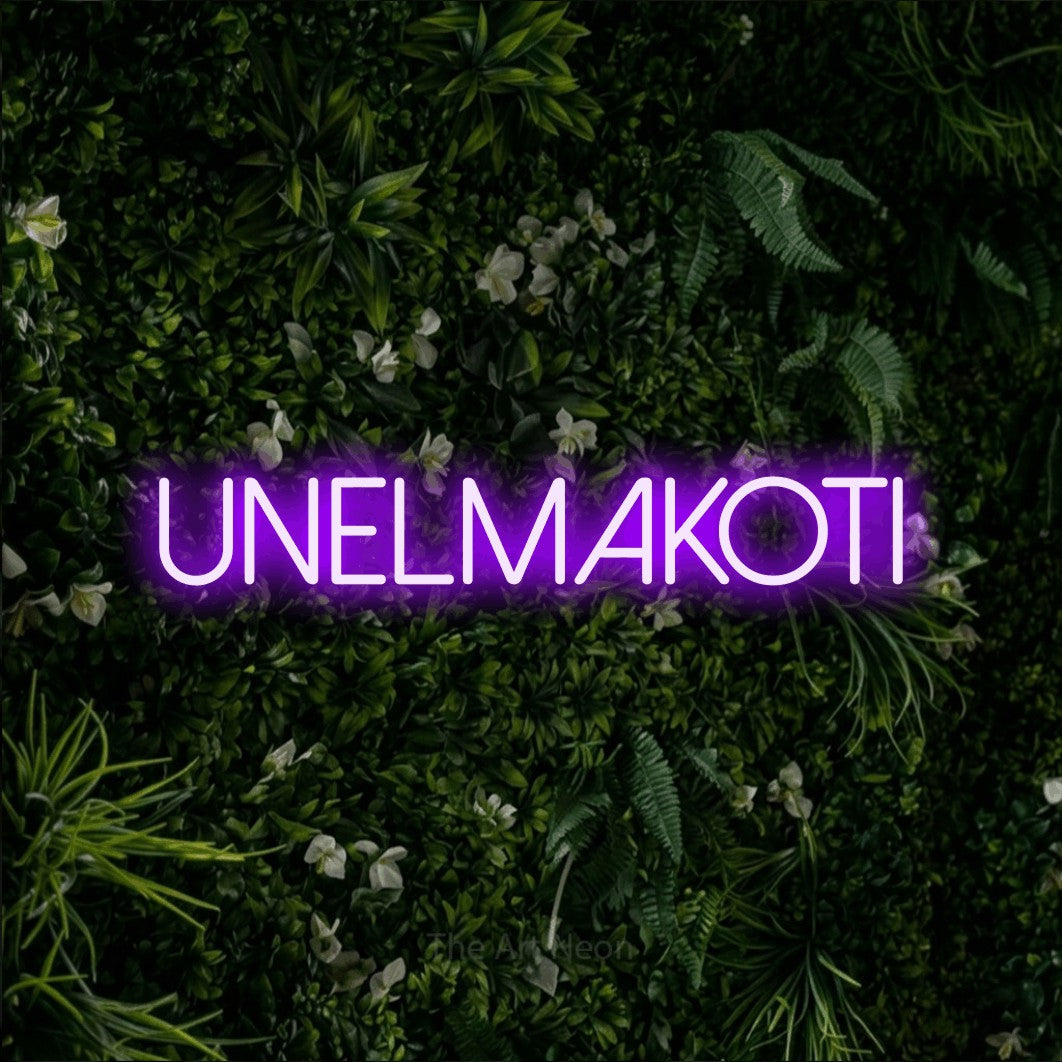 LED neon sign reading “UNELMAKOTI”, arranged in a single line.