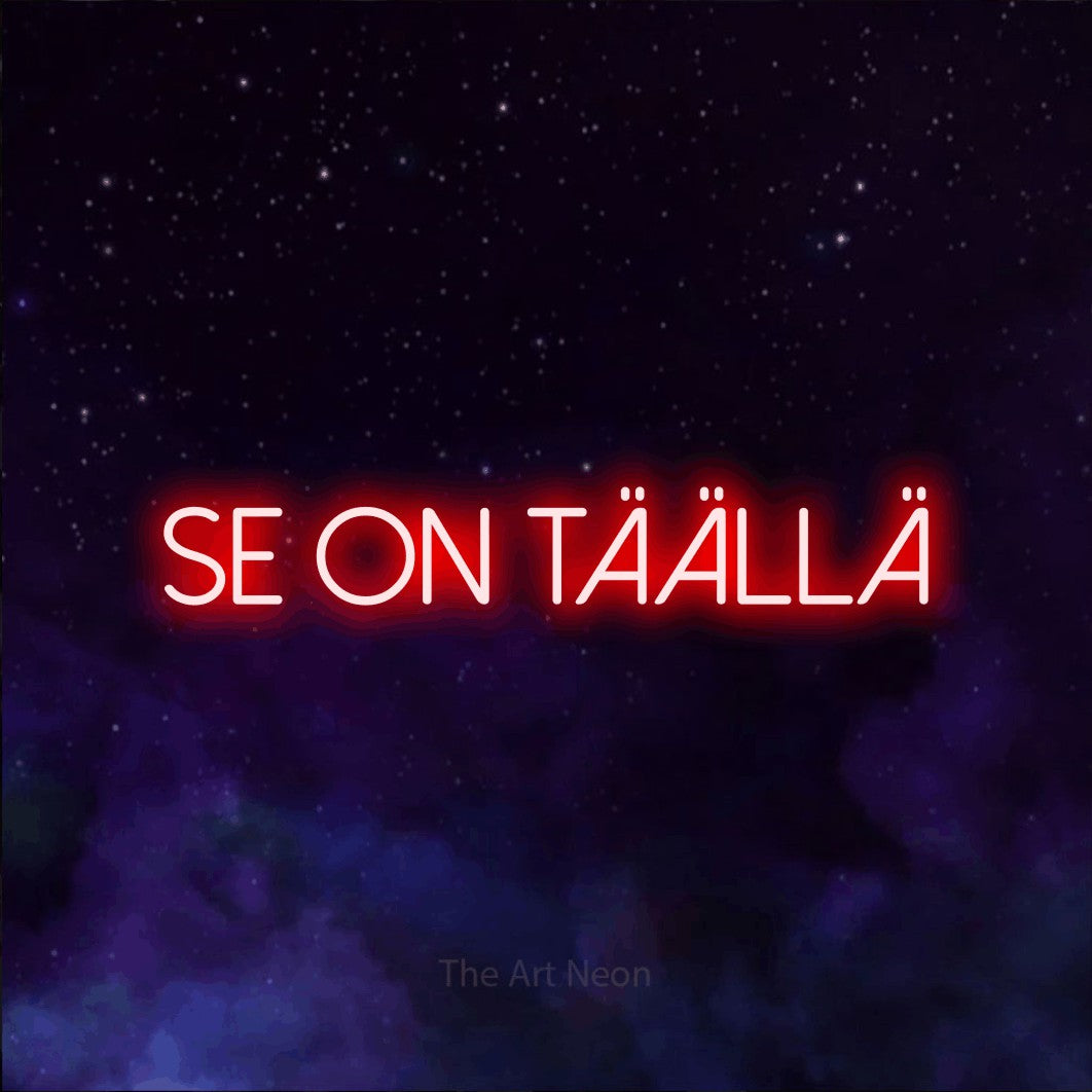 LED neon sign reading “Se on täällä”, arranged in a single line.