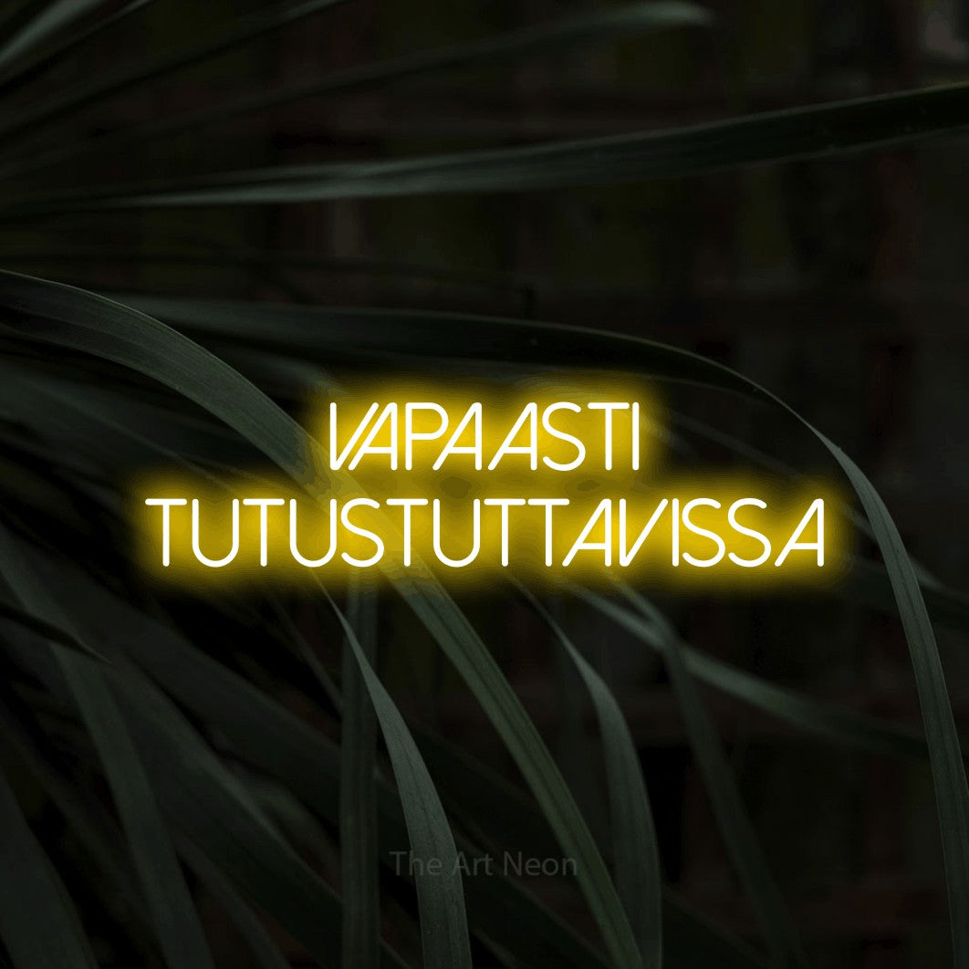 LED neon sign reading “Vapaasti tutustuttavissa”, arranged in 2 lines.
