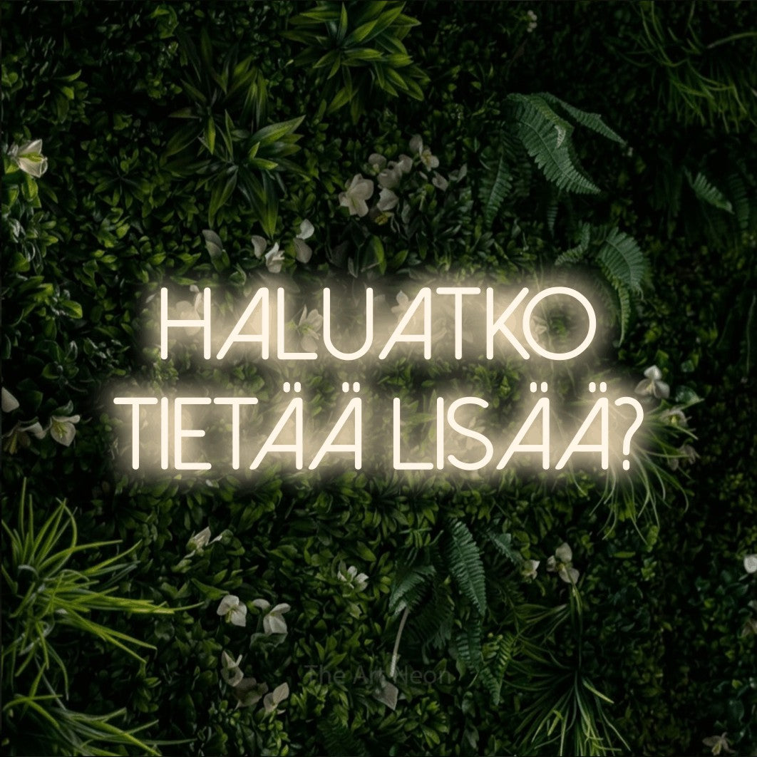 LED neon sign reading “Haluatko tietää lisää?”, arranged in 2 lines.