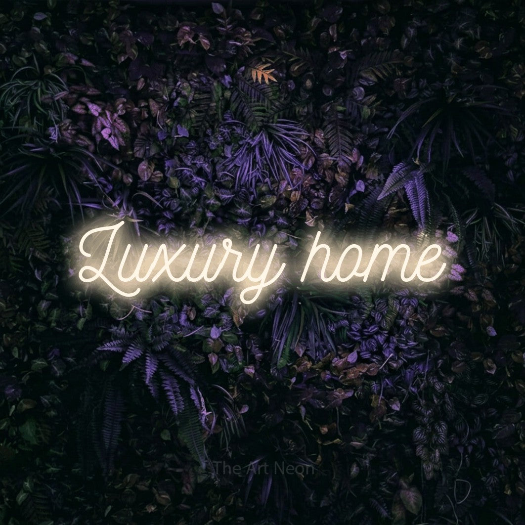 LED neon sign reading “Luxury home”, arranged in a single line.