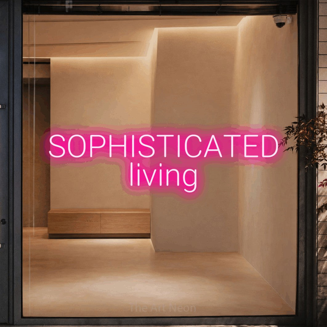 LED neon sign reading “SOPHISTICATED living”, arranged in 2 lines.