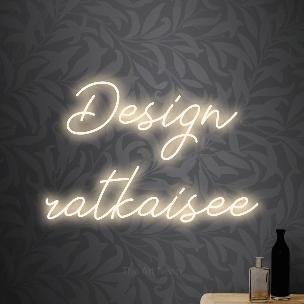 LED neon sign reading “Design ratkaisee”, arranged in 2 lines.