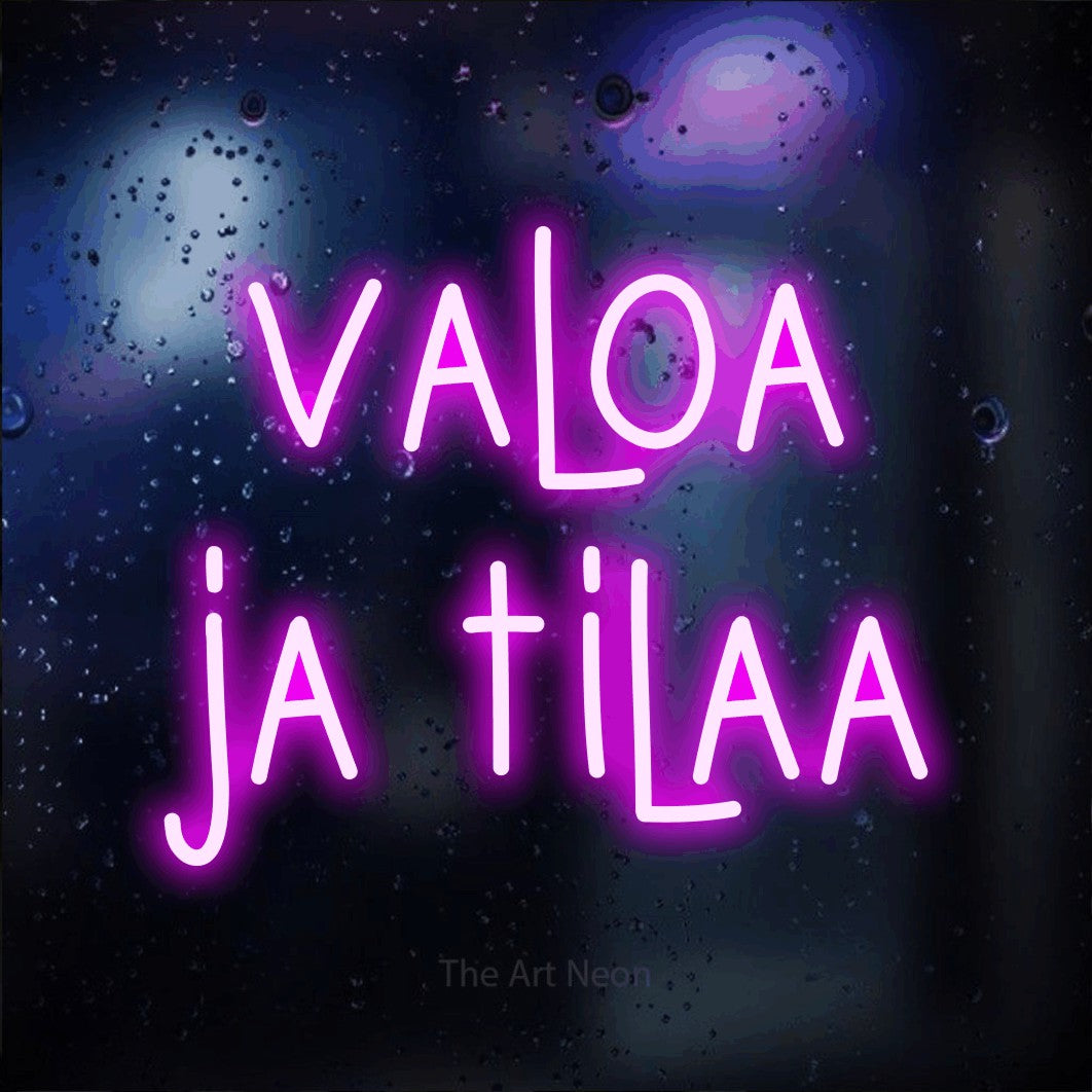 LED neon sign reading “valoa ja tilaa”, arranged in 2 lines.