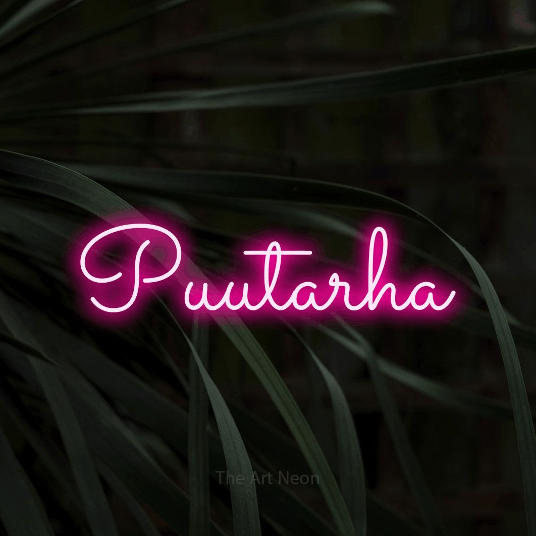 LED neon sign reading “Puutarha”, arranged in a single line.