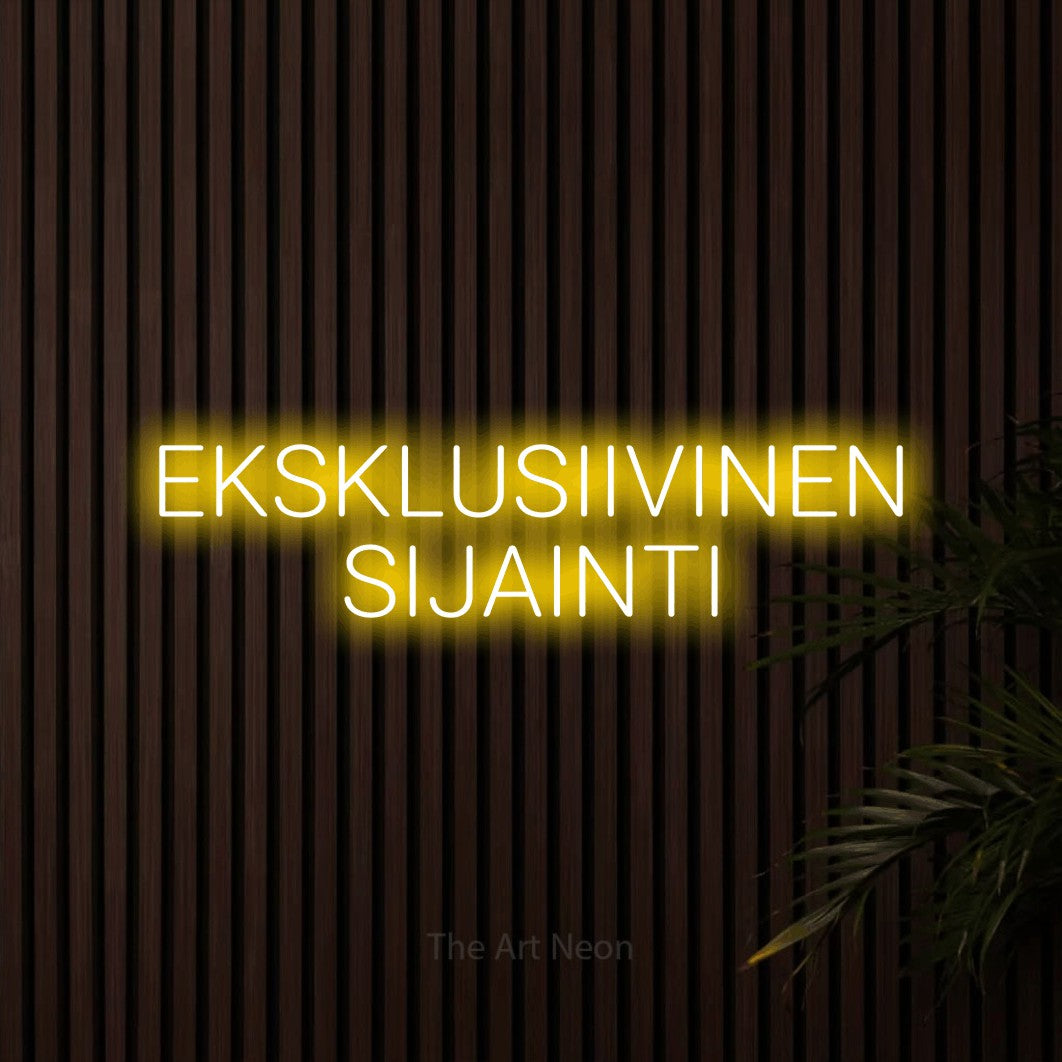 LED neon sign reading “EKSKLUSIIVINEN SIJAINTI”, arranged in 2 lines.