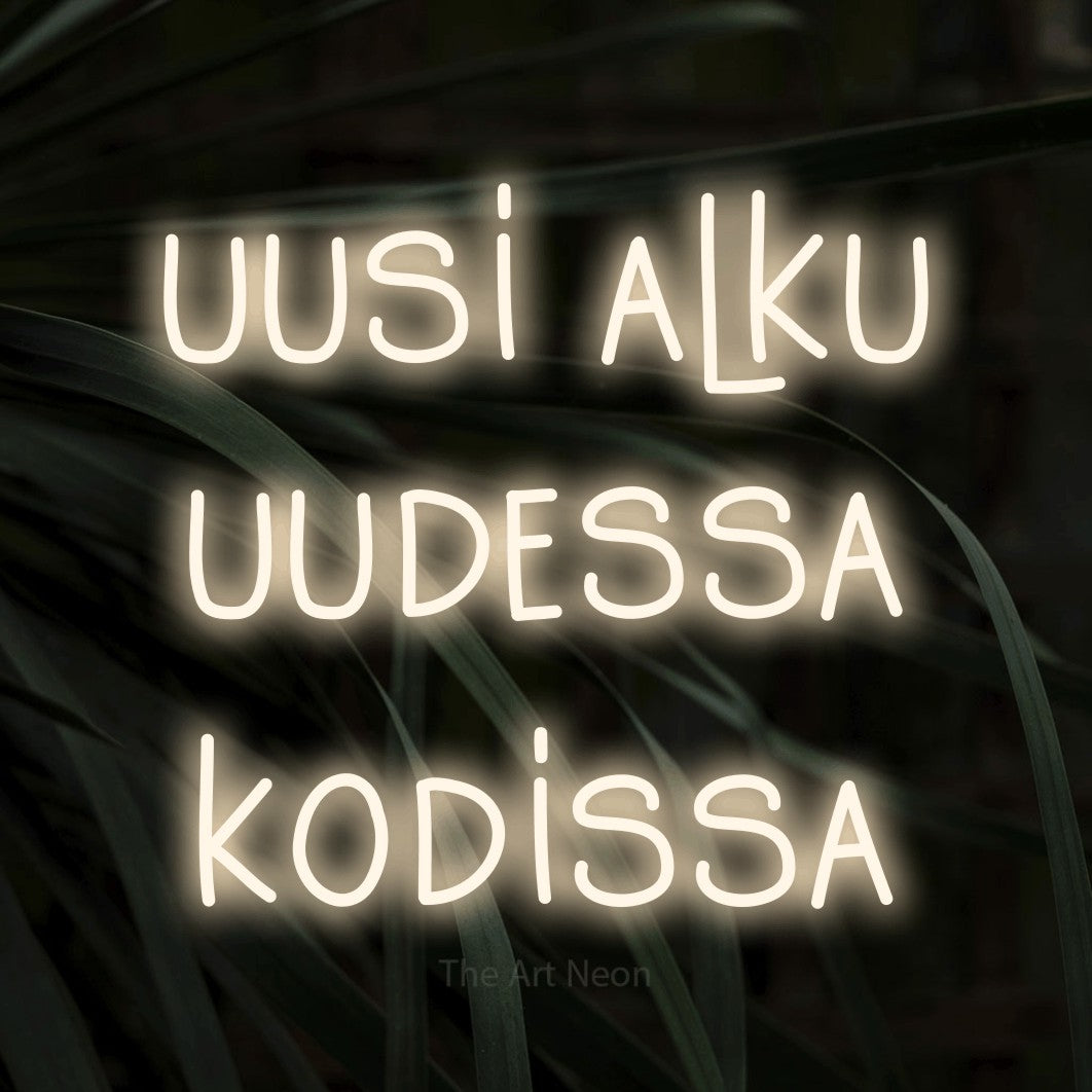 LED neon sign reading “uusi alku uudessa kodissa”, arranged in 3 lines.