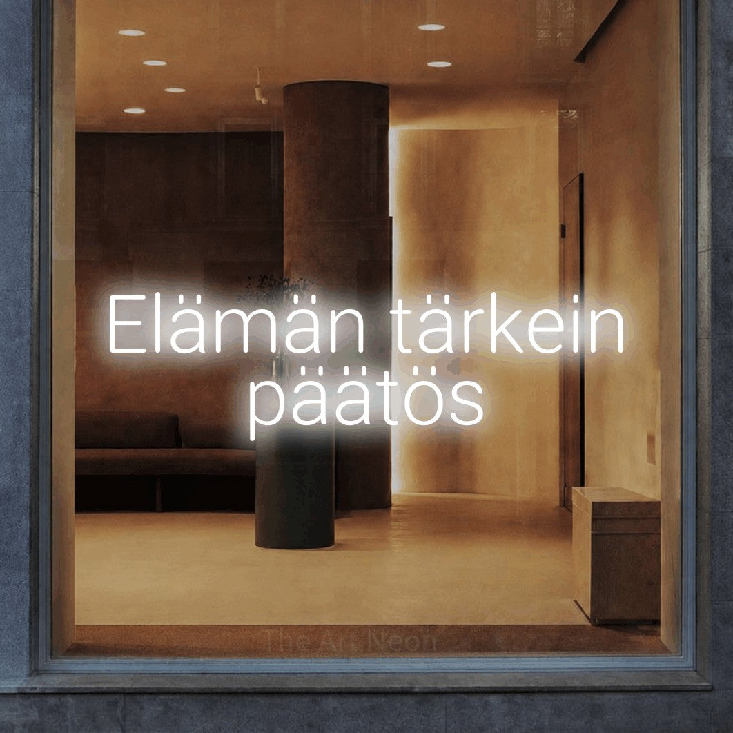 LED neon sign reading “Elämän tärkein päätös”, arranged in 2 lines.