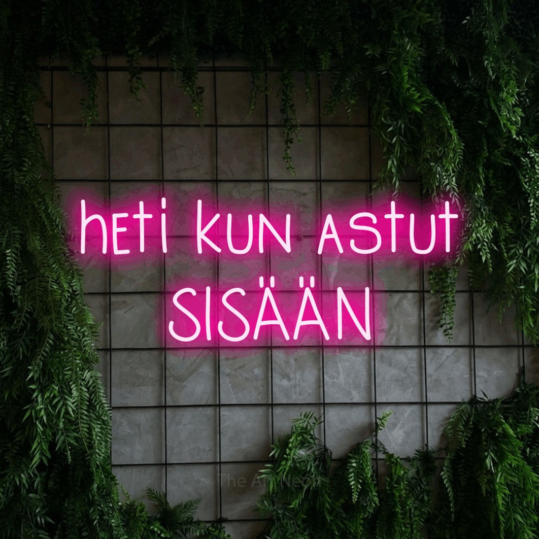 LED neon sign reading “heti kun astut SISÄÄN”, arranged in 2 lines.
