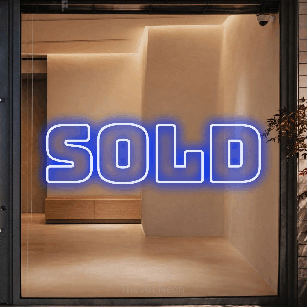 LED neon sign reading “Sold”, arranged in a single line.
