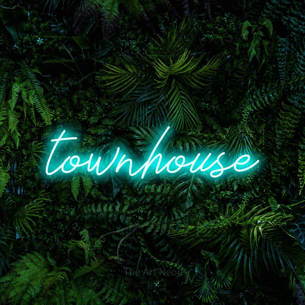 LED neon sign reading “townhouse”, arranged in a single line.