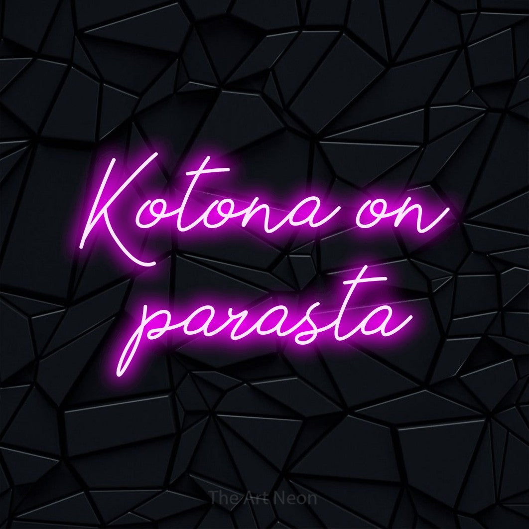 LED neon sign reading “Kotona on parasta”, arranged in 2 lines.