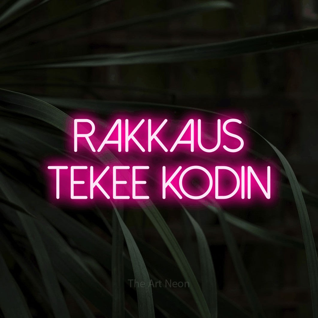 LED neon sign reading “Rakkaus tekee kodin”, arranged in 2 lines.