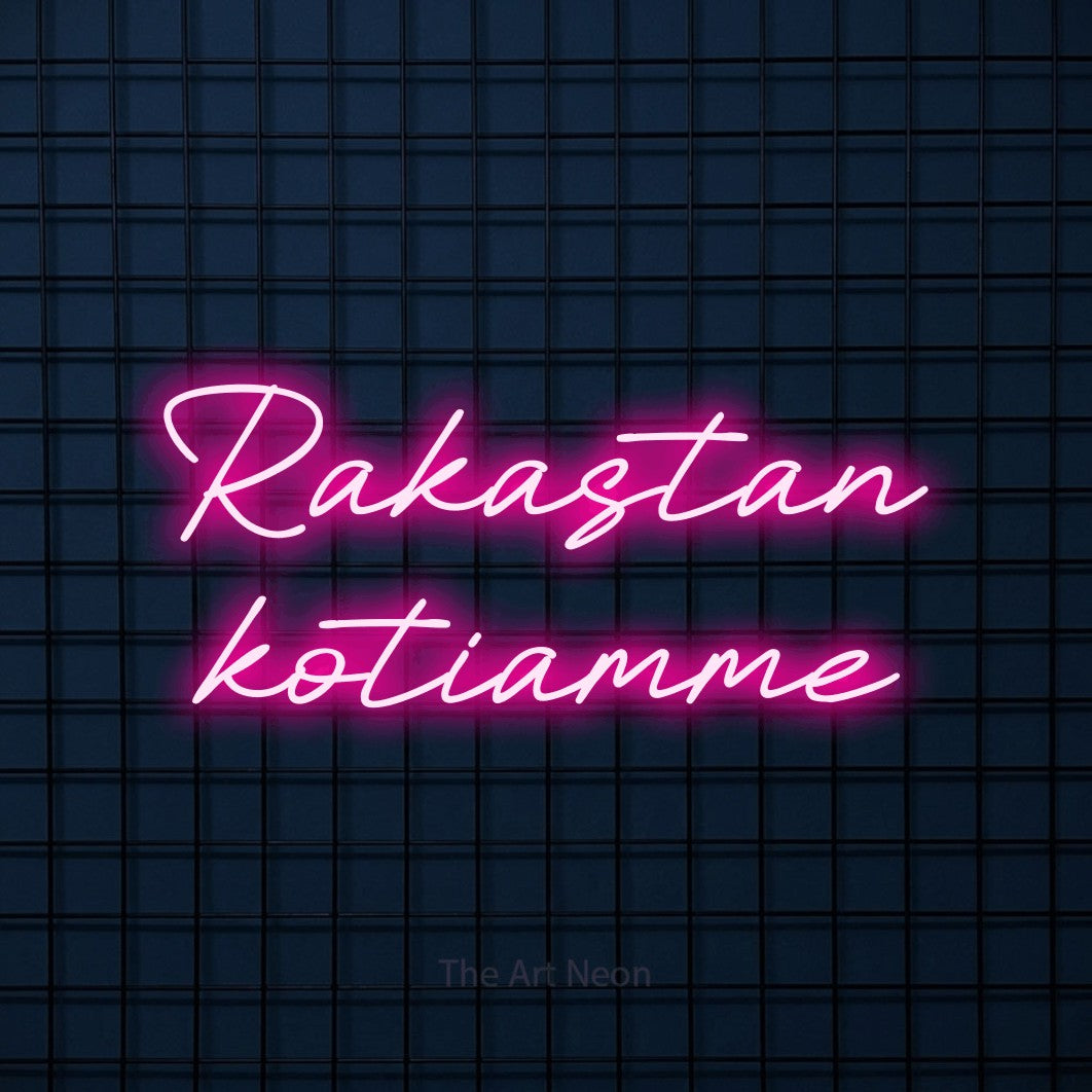 LED neon sign reading “Rakastan kotiamme”, arranged in 2 lines.