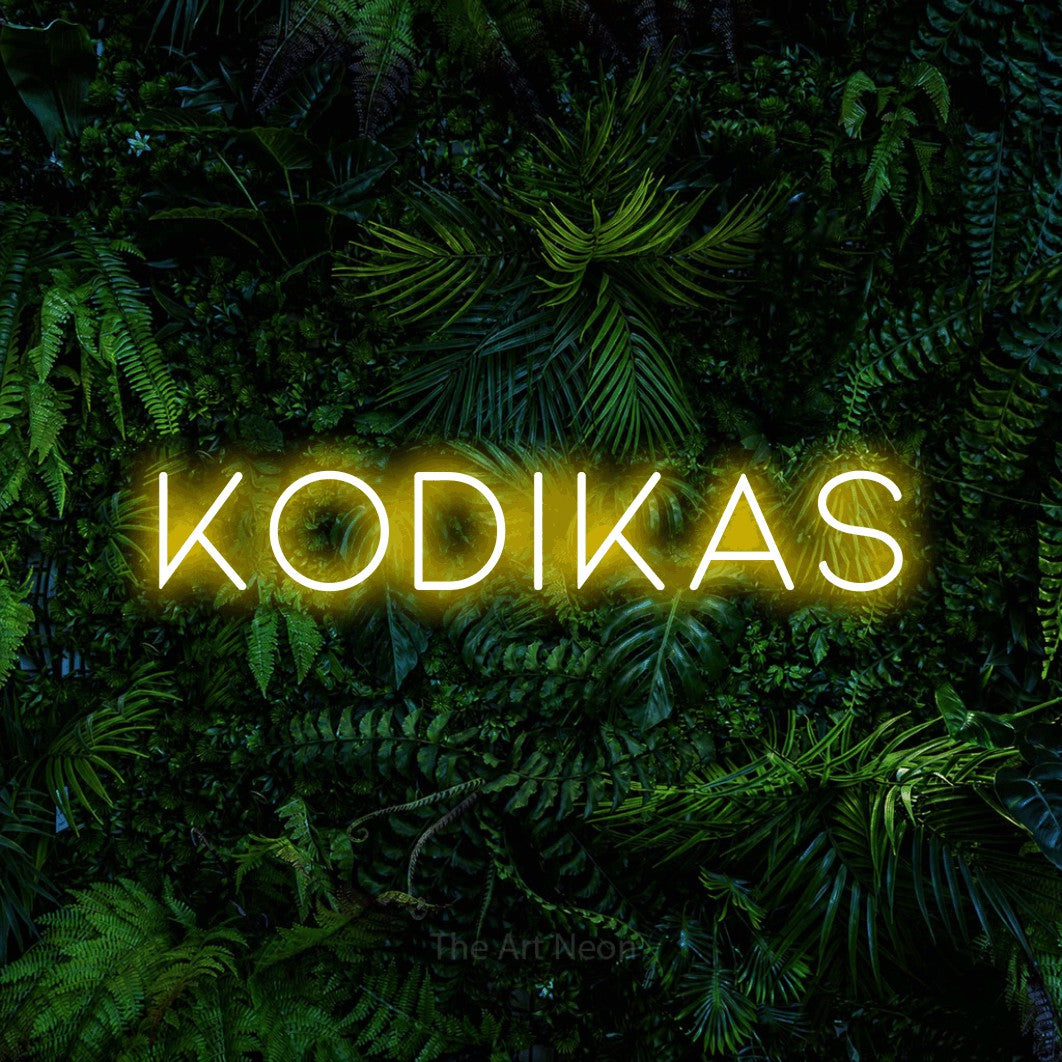 LED neon sign reading “Kodikas”, arranged in a single line.