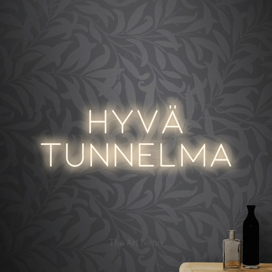 LED neon sign reading “HYVÄ TUNNELMA”, arranged in 2 lines.