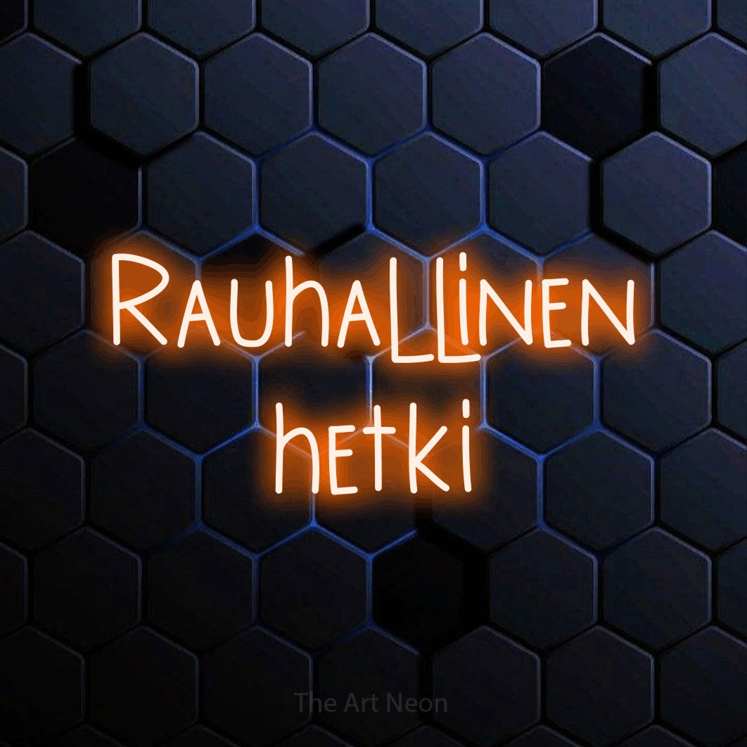 LED neon sign reading “Rauhallinen hetki”, arranged in 2 lines.