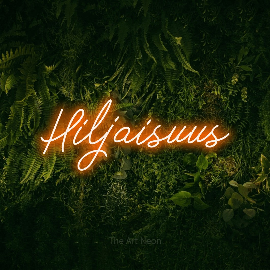 LED neon sign reading “Hiljaisuus”, arranged in a single line.