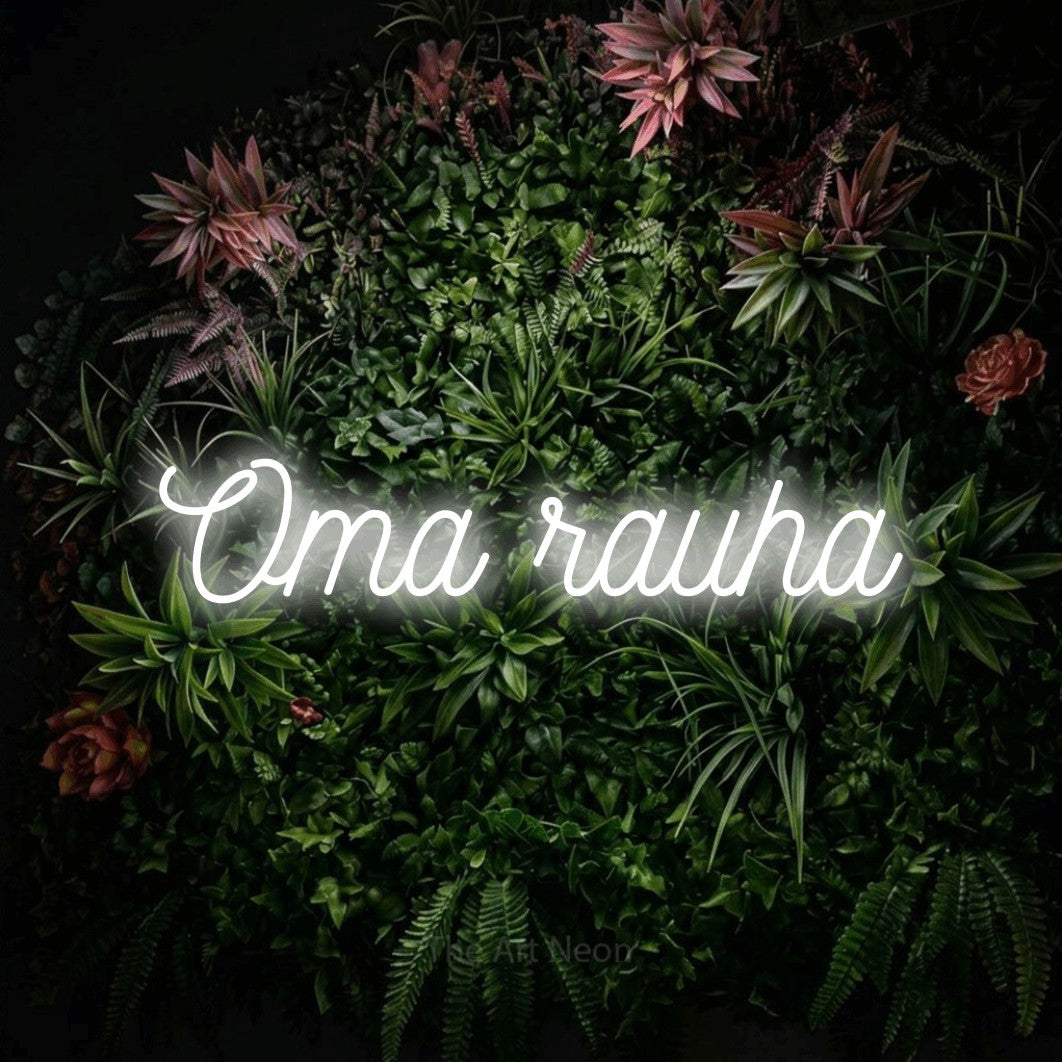 LED neon sign reading “Oma rauha”, arranged in a single line.