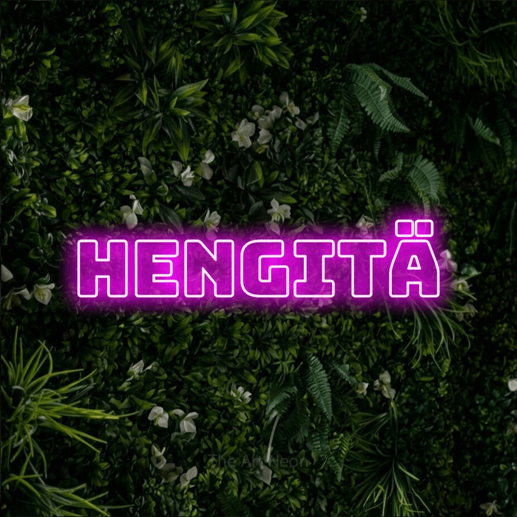 LED neon sign reading “Hengitä”, arranged in a single line.